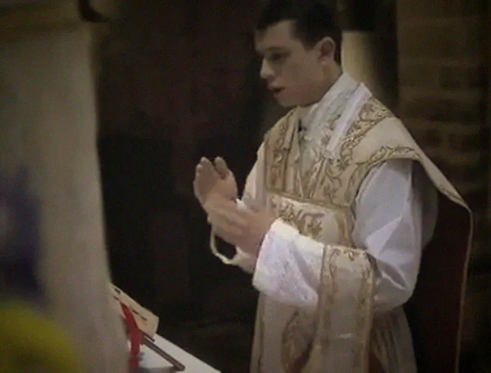 The priest at the missal on the Epistle side.